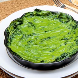 Creamy spinach with a hint of nutmeg, served au gratin style.